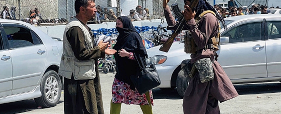 Afghans outside security checkpoint