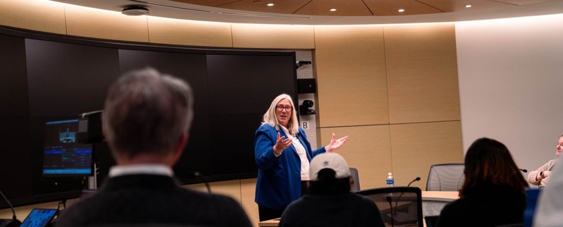 Header of Sue Gordon at Kelleher Forum