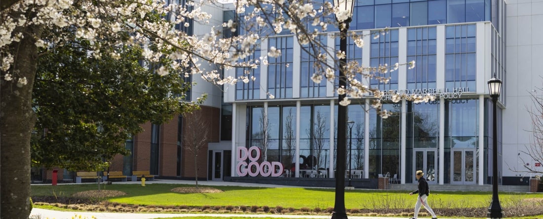 Thurgood Marshall Hall with cherry blossoms in the foreground